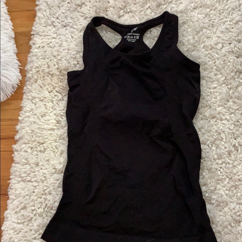 Small, Spandex athletic tank top. Built in Bra